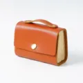 Retro Leder Notizbuch Taschenformat mit Griff und Druckknopf, Vintage Reisetagebuch. - Geöltes Leder Orange
