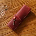 Retro genuine leather roll-up pencil case in red, minimalist vintage pen storage pouch. - Crazy Horse Wine Red