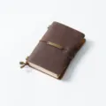 Vintage brown crazy horse leather traveler notebook journal with metal plate clasp variant. - Passport Size / Crazy Horse Coffee