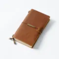 Vintage genuine leather traveler notebook diary notepad with elastic band and metal charm. - Portable Size / Crazy Horse Brown