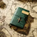 Vintage leather travelers notebook journal diary with airplane charm and brass bookmark. - Passport Size / Dark Green