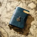 Vintage leather travel journal notebook, dark blue TN planner with compass charm. - Passport Size / Blue