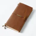 Vintage brown leather traveler notebook with elastic band and metal quote plate for daily journaling - Regular Fit / Crazy Horse Brown
