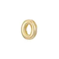 Detail macro view of a shiny gold bubble letter O pendant for DIY jewelry making - Letter O