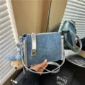 Retro blue denim crossbody bag featuring silver hardware and a plush bear charm - Metallic Texture Splicing Style / Silver With Pendant