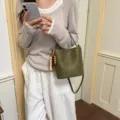 Stylish olive green woven leather bucket bag with wood bead charm for women's use - Pendant Style / Green
