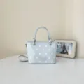 Hellblaue Polka-Dot-Beuteltasche mit Tragegriff und verstellbarem Schultergurt - Einzelne Tasche / Blau