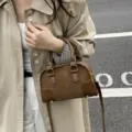 Stylish brown soft leather pillow handbag with MERFIL logo and adjustable strap - Bag Only / Brown