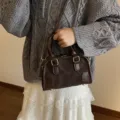 Vintage dark brown pillow handbag with minimalist design and soft leather texture - Bag Only / Coffee