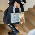 Stylish light denim blue mini tote bag with woven handles and a cute bear plush charm - With Pendant / Light Blue