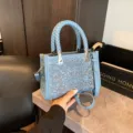 Stylish denim blue small tote bag with woven handles and sparkling sequin grid pattern - Single Bag / Light Blue
