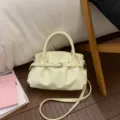 Elegante cremeweiße Retro-Faltenhandtasche mit Gürteldesign aus weichem Kunstleder - Einzelne Tasche / Gelb