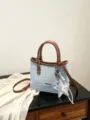 Light blue denim bucket bag with brown handles and a silver star charm - Brown Blue (With Charm) / With Pendant