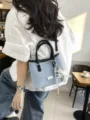 Light blue denim bucket bag with black leather handles and star charm - Black Blue (With Charm) / With Pendant
