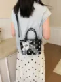 Schwarze Polka Dot Beuteltasche mit Spitzenschleife und Musiknoten-Anhänger - Mit Anhänger / Schwarz