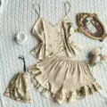Two-piece floral faux silk pajama set with camisole and ruffled shorts in champagne - S / Top And Bottom / 3 Pieces/Pack (Including Bag) / Champagne Cherry