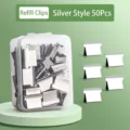 Set of 50 silver metal refill clips for paper push stapler organized in a storage box - Silver Refill Clips