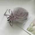 Detailed macro view of elegant mesh rose hair claw clip with delicate ribbon and rhinestone - Lazy Hair Clip / Purple Pink