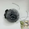 Close-up detail of an elegant gray mesh rose hair tie featuring black crystal beads - Hair Tie / Gray