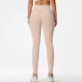 Pantaloni da yoga a vita alta senza cuciture effetto push-up, leggings sportivi elastici da donna. - Colore pelle