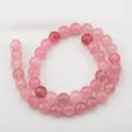 Pink strawberry dyed quartz round beads for DIY jewelry making and bracelet assembly. - 10mm (Approx 37 Beads/Pack) / Pink