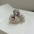 Detailed macro view of exquisite bellflower beaded hair claw clip with pink crystal accents - S / Light Blue & Pink