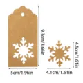 Vista detallada de la etiqueta de papel kraft con recorte de copo de nieve y dimensiones - 100 Piezas Estilo Copo de Nieve (Con 10m Cuerda)