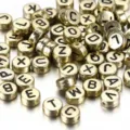 Gold acrylic alphabet beads with black letters for DIY jewelry making accessories. - 100 Pieces/Pack / Gold With Black Letters