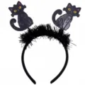 Detailed view of Halloween headband with cartoon black cats and black tinsel trim. - Black Cat (6105911397688)