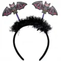 Close-up detail of Halloween bat headband featuring colorful skeleton patterns and black tinsel - Undead Bat (6105911397691)