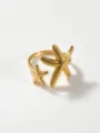 Detailed view of the trendy gold stainless steel double starfish open ring with fine texture. - Dotted Starfish Rings