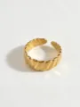Close-up detail shot of a stylish gold-plated geometric wavy open ring for women. - Twisted Rope Ring