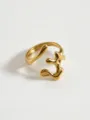Detailed close-up of the modern geometric hollow stainless steel gold ring showcasing fine texture. - Coral Rings