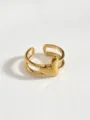 Close-up detail of 18K gold plated stainless steel open heart ring, modern geometric style. - Glossy Heart Ring