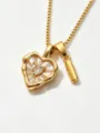 Detail view of dainty gold stainless steel box chain necklace with mother of pearl heart pendant. - Letter I