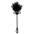 Detailed view of Halloween witch broom prop with black tulle stars and moon decoration - One Size / Black