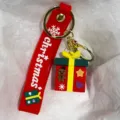 Roter Silikon Weihnachts Schlüsselanhänger mit Geschenkkarton und Lebkuchenmann Detail - Stern- und Herz-Geschenkbox-Stil