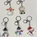 Set mit fünf niedlichen Weihnachts-Schlüsselanhängern mit Schneemännern und einem Rentier - Mehrfach-Pose Schneemann und Elch (Set 4)