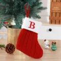 Festive red knit Christmas stocking featuring a white cuff and embroidered letter B - Red (B)
