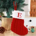Red knitted Christmas stocking with white trim and red embroidered letter E - Red (E)