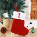Cozy red knitted Christmas stocking featuring a white cuff and red letter I embroidery - Red (I)