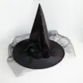 Detailed view of a black satin witch hat featuring elegant mesh veil and rose accents - One Size / Black