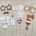 Elegantes Set mit Babyparty Fotobox Requisiten in Roségold und Oh Baby Schriftzug - Goldgeprägtes Baby