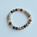 Close-up detail of natural stone beaded bracelet showing frosted texture and earthy tones. - 3# Matte Striped Agate