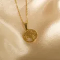 Gold stainless steel tree pendant necklace detail view, elegant fashion jewelry accessory. - Tree Shape