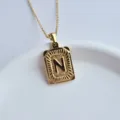 Gold stainless steel letter N square pendant necklace detail view, fashion hip-hop jewelry style. - Letter N Square Pendant / Gold