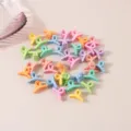 Assorted set of colorful 2cm mini plastic hair claw clips in soft pastel shades - Crossed / 10 Pieces Pack / Matte Multicolor