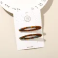 Pair of elegant tortoise shell acetate hair clips with blue accents on display card - Hollow Oval (#2) / 2-Piece Set (Card Packed) / Blue Coffee Floral