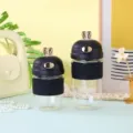 Zweiteiliges Set süße Glas-Trinkflaschen mit Hasenohren, Strohhalm und Silikonhülle - 350ml / Schwarz