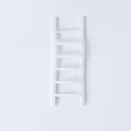 Dettaglio macro di una scala decorativa bianca minimalista per torte di compleanno - Set di 3 / Bianco